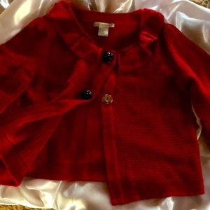 Dressy Red sweater with large black flower buttons and large snaps